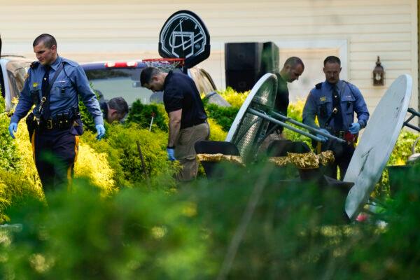 Investigators work the scene of a shooting in Fairfield Township, N.J., on May 23, 2021. (Matt Rourke/AP Photo)