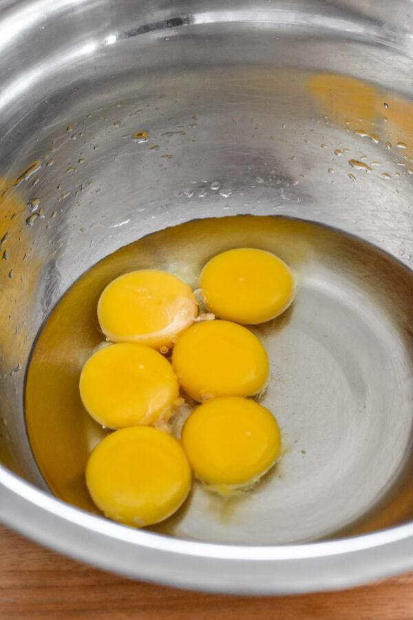 Add the egg yolks.
