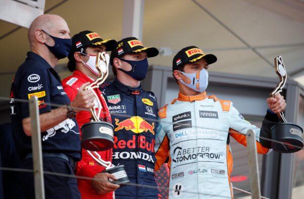 First place Red Bull driver Max Verstappen of the Netherlands (C) second place Ferrari driver Carlos Sainz of Spain (2nd-L) and third place Mclaren driver Lando Norris of Britain (R) celebrate with their trophies on the podium during the Monaco Grand Prix at the Monaco racetrack, in Monaco, on May 23, 2021. (Sebastien Nogier/Pool via AP)