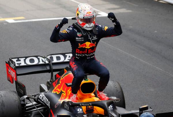 Red Bull driver Max Verstappen of the Netherlands celebrates on his car after winning the Monaco Grand Prix at the Monaco racetrack, in Monaco, on May 23, 2021. (Gonzalo Fuentes/Pool via AP)