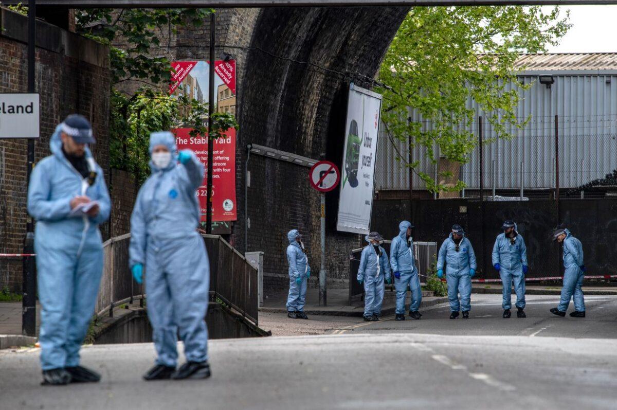 Police forensic officers on Consort Road as they investigate the shooting of Sasha Johnson in London, on May 24, 2021. (Chris J Ratcliffe /Getty Images)