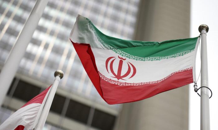 Iran and IAEA Extend Monitoring Deal, Averting Crisis in Nuclear Talks