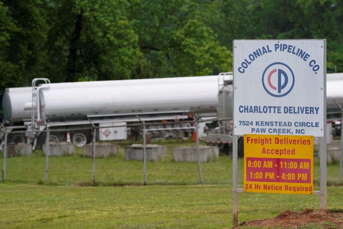 Tanker trucks are parked near the entrance of Colonial Pipeline Company in Charlotte, N.C., on May 12, 2021. (Chris Carlson/AP Photo)