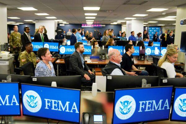 FEMA employees listen to President Joe Biden talk at FEMA headquarters in Washington on May 24, 2021. (Evan Vucci/AP Photo)