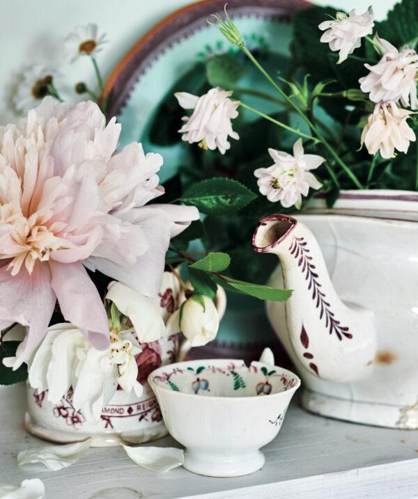 Antique china repurposed as flower vases. (Ben Edwards © Ryland Peters & Small)