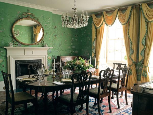 A timeworn rug is part of this English-style dining room. (Christopher Drake © Ryland Peters & Small)