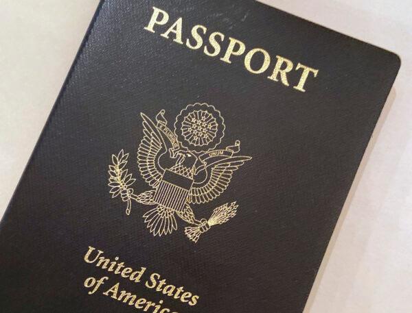 A U.S. passport cover.  (AP Photo/Eileen Putman)
