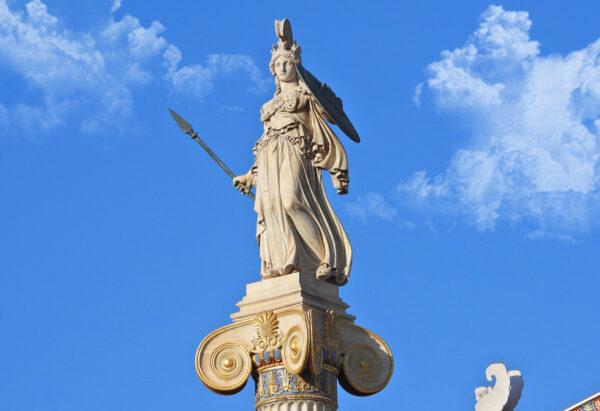 A statue of Athena stands in front of the Academy of Athens in Athens, Greece. (Aerial-motion/Shutterstock)
