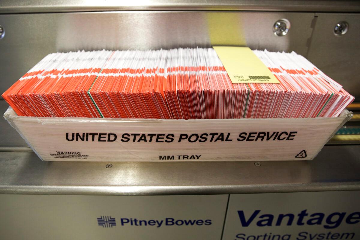 A box of ballots to be sorted is pictured in a US Postal Service box on Election Day at the King County Elections office in Renton, Wash., on Nov. 3, 2020. (Jason Redmond/AFP via Getty Images)