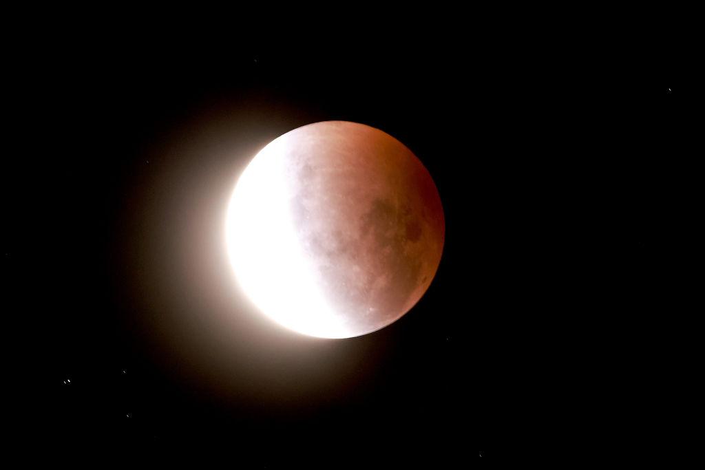 The lunar eclipse begins on May 26, 2021 in Auckland, New Zealand. (Phil Walter/Getty Images)