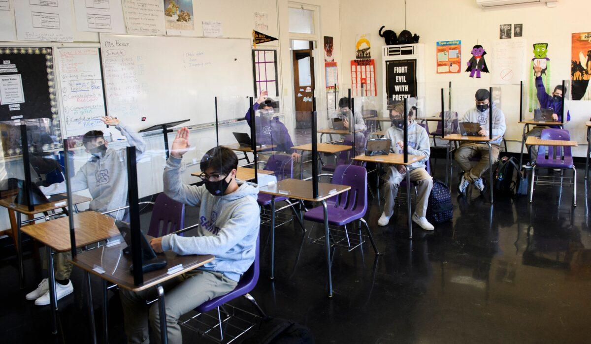Students attend an in-person English class in Long Beach, Calif., on March 24, 2021. (Patrick T. Fallon/AFP via Getty Images)