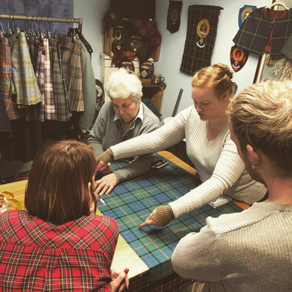 Kilt makers work together at The Kiltmakery in Edinburgh, Scotland. (The Kiltmakery & ScotClans)