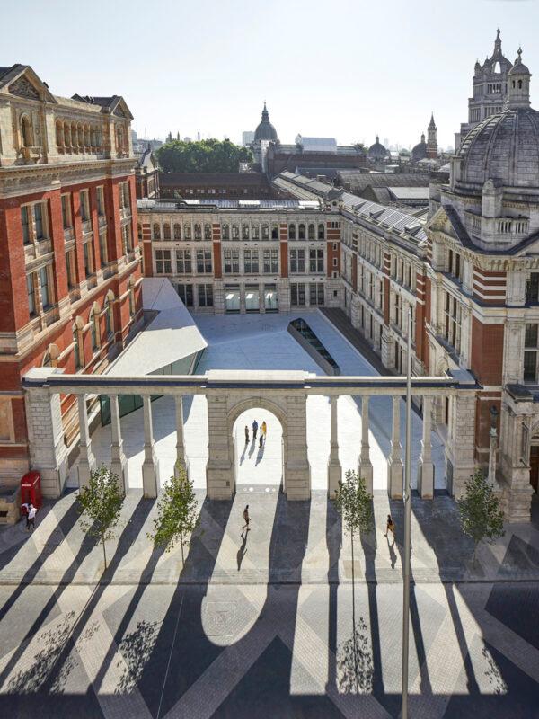 Visitors enter the Sackler Courtyard of the museum through the Ashton Webb Screen, an arch and colonnade that once hid the museum's Victorian boilers. (Victoria and Albert Museum, London)