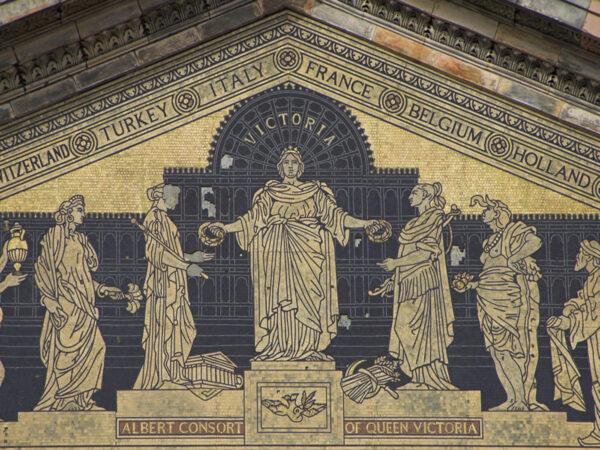 A mosaic on the pediment of the Lecture Theater Block shows Queen Victoria in the center awarding laurel leaves to prize winners at “The Great Exhibition of the Works of Industry of All Nations” held in London’s Hyde Park in 1851. The exhibition hall, seen as a silhouette on the mosaic, was a temporary glass structure and an engineering marvel. It was dubbed the “Crystal Palace.” Profits from the exhibition funded a new cultural district in South Kensington, West London. (Pres Panayotov/Shutterstock)