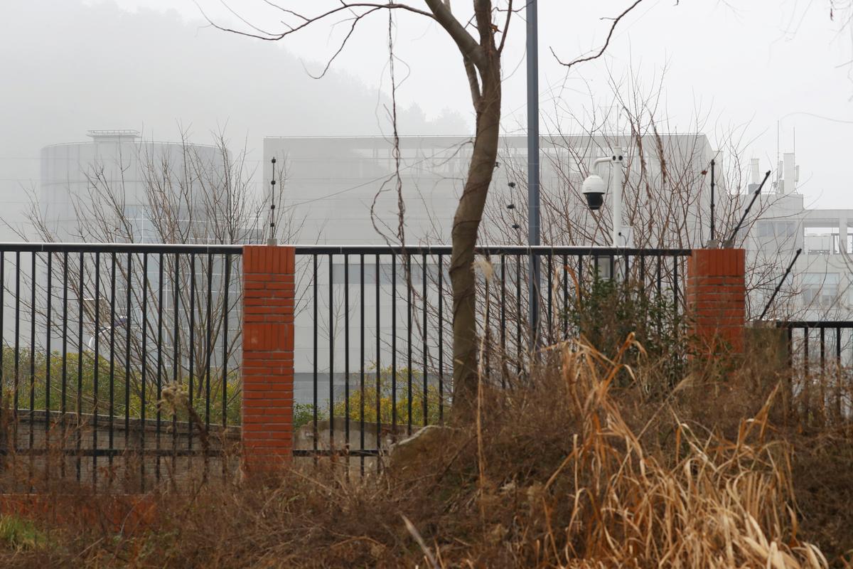 The P4 laboratory of Wuhan Institute of Virology is seen behind a fence during the visit by the World Health Organization team tasked with investigating the origins of the coronavirus disease (COVID-19), in Wuhan, Hubei Province, China, on Feb. 3, 2021. (Thomas Peter/Reuters)