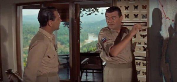 William Holden (L) and Jack Hawkins in “The Bridge on the River Kwai.” (Columbia Pictures)