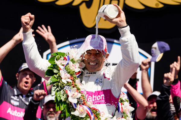 Helio Castroneves of Brazil celebrates after winning the Indianapolis 500 auto race at Indianapolis Motor Speedway in Indianapolis, Ind., on May 30, 2021. (Michael Conroy/AP Photo)