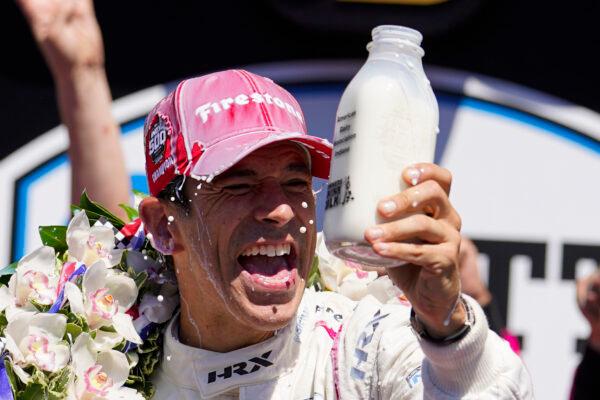Helio Castroneves of Brazil celebrates after winning the Indianapolis 500 auto race at Indianapolis Motor Speedway in Indianapolis, Ind., on May 30, 2021. (Michael Conroy/AP Photo)