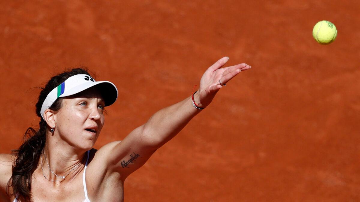 Romania's Patricia Maria Tig in action during her first round match against Japan's Naomi Osaka, in French Open—Roland Garros, in Paris, France, on May 30, 2021. (Christian Hartmann/Reuters)