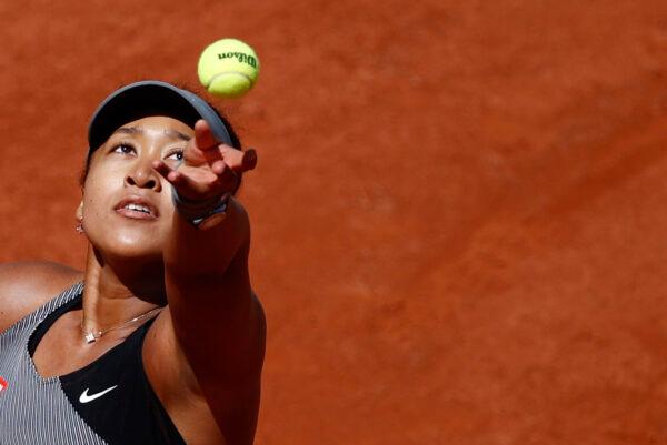 Japan's Naomi Osaka in action during her first round match against Romania's Patricia Maria Tig, at French Open, in Paris, France, on May 30, 2021. (Christian Hartmann/Reuters)