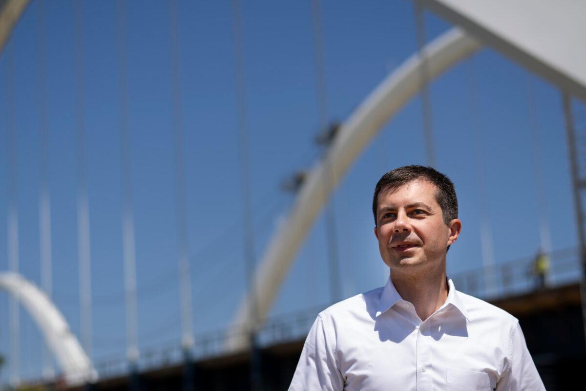 Transportation Secretary Pete Buttigieg arrives for a news conference after touring the construction site atop the new Frederick Douglass Memorial Bridge in Washington on May 19, 2021. (Drew Angerer/Getty Images)