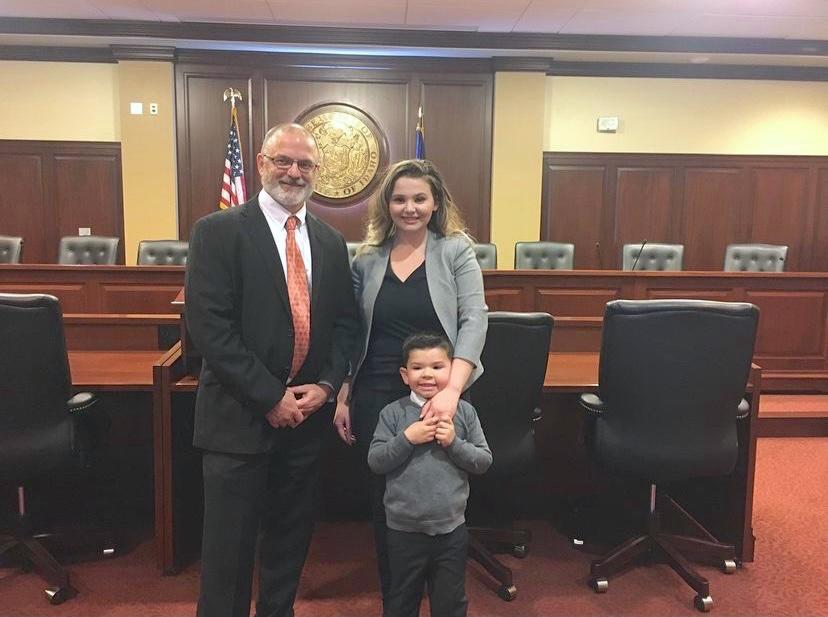 Rebekah and her son with Dr. Matt Harrison while testifying in Idaho for an abortion pill reversal consent law in 2017. (Courtesy of <a href="http://www.rebekahhagan.org/">Rebekah Hagan</a>)