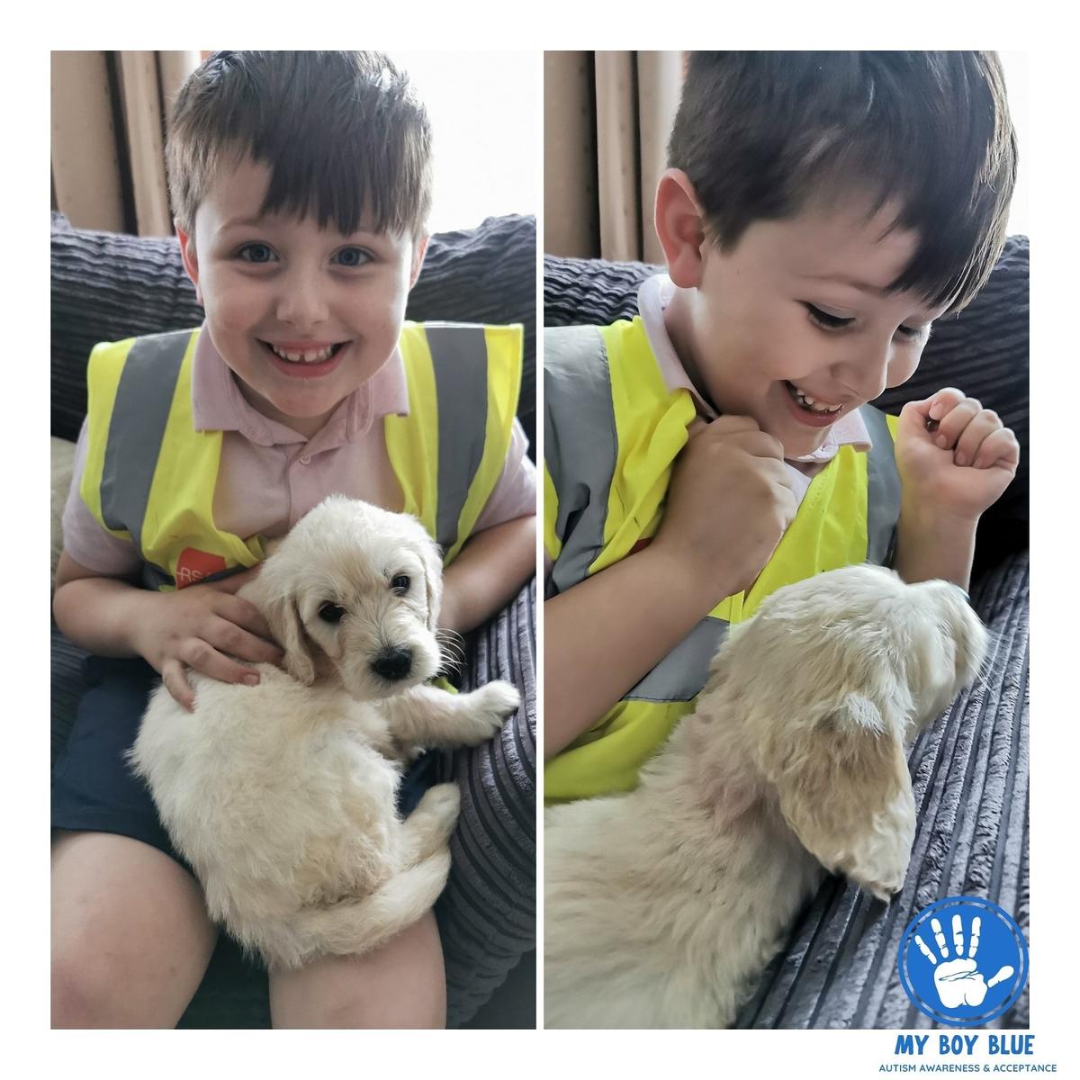 Riley holding My Canine Companion's autism service puppy in-training who was named after him. (Courtesy of <a href="https://www.facebook.com/myboyblue2017/">Nicole Duggan</a>)