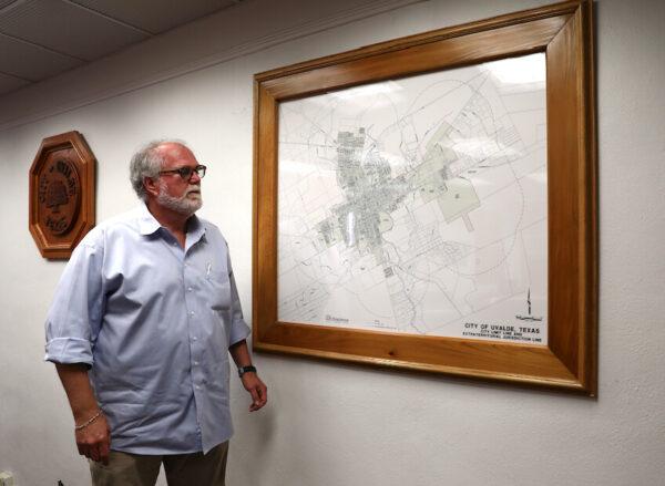 Uvalde Mayor Don McLaughlin looks at a map of Uvalde at City Hall in Uvalde, Texas, on May 26, 2021. (Charlotte Cuthbertson/The Epoch Times)