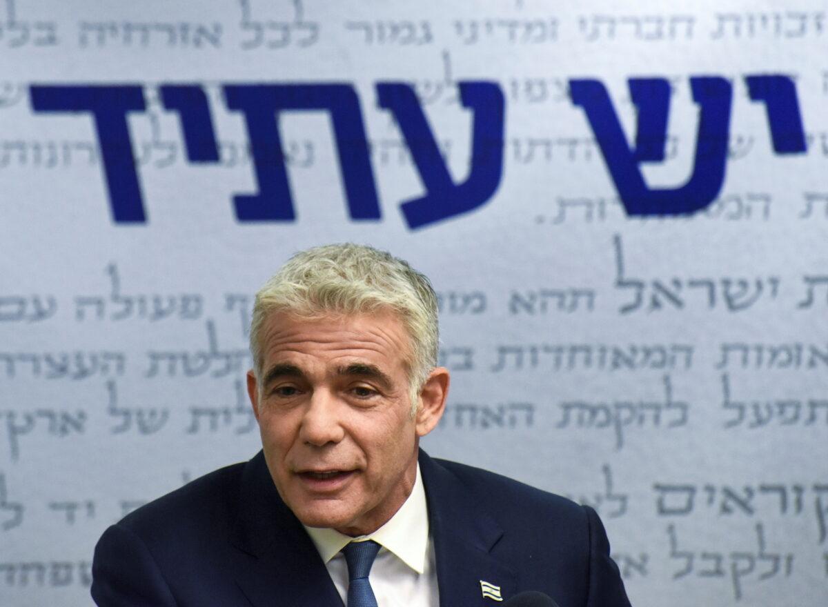 Yair Lapid delivers a statement to the press before the party faction meeting at the Knesset, Israel's parliament, in Jerusalem, Israel, on May 31, 2021. (Debbie Hill/Pool via Reuters)