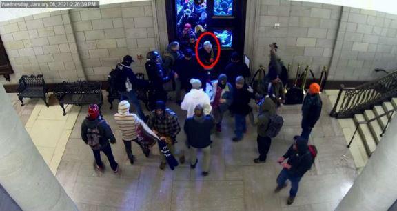 In this image from video, a woman identified by the FBI as Audrey Ann Southard-Rumsey enters the U.S. Capitol in Washington on Jan. 6, 2021. (FBI)