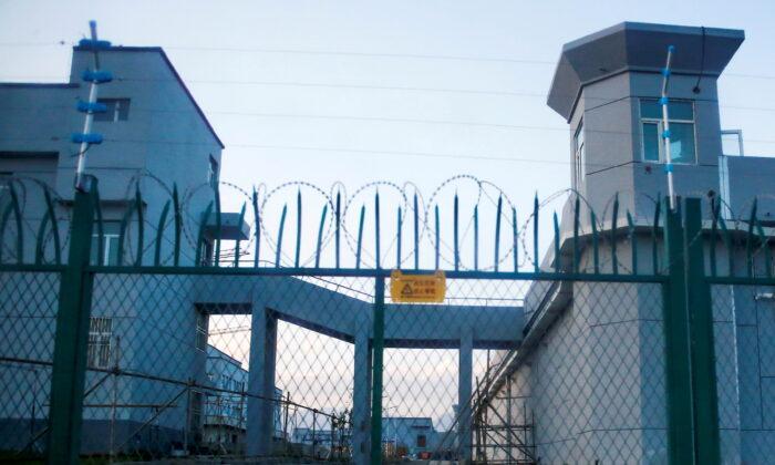 A perimeter fence is constructed around what is officially known as a vocational skills education center in Dabancheng, Xinjiang Province, China, on Sept. 4, 2018. (Thomas Peter/Reuters)