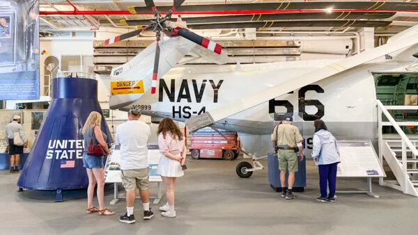 Visitors walk around inside the USS Hornet Museum and learn about the ship’s history and World War II, in Alameda, Calif., on May 31, 2021. (Ilene Eng/The Epoch Times)