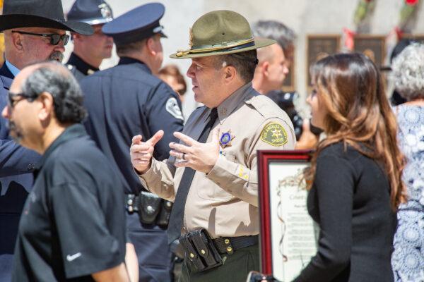 Los Angeles County Sheriff Alex Villanueva (C) attends an annual service honoring fallen peace officers in Tustin, Calif., on May 27, 2021. (John Fredricks/The Epoch Times)