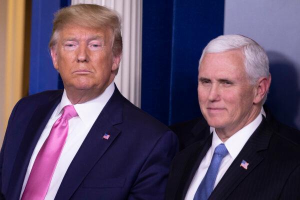 Then-President Donald Trump looks on after a news conference with then-Vice President Mike Pence in the Brady Press Briefing Room at the White House in Washington on Feb. 26, 2020. (Tasos Katopodis/Getty Images)
