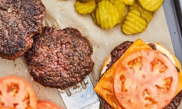Achieving perfectly crisp, craggy-edged burgers is all about the smashing technique. (Jesse Szewczyk/TNS)
