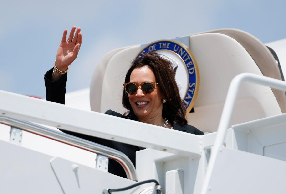 Vice President Kamala Harris waves as she boards Air Force Two for her first international trip as vice president to Guatemala and Mexico, at Joint Base Andrews, Md., on June 6, 2021. (Carlos Barria/Reuters)