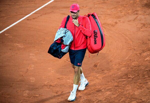Switzerland's Roger Federer leaves the court after winning against Germany's Dominik Koepfer during their men's singles third round tennis match on Day 7 of The Roland Garros 2021 French Open tennis tournament in Paris, France, on June 5, 2021. (Martin Bureau/AFP via Getty Images)