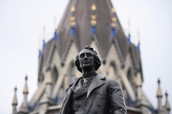 A statue of Canada’s first prime minister Sir John A. Macdonald on Parliament Hill in Ottawa on June 3, 2021. (The Canadian Press/Sean Kilpatrick)
