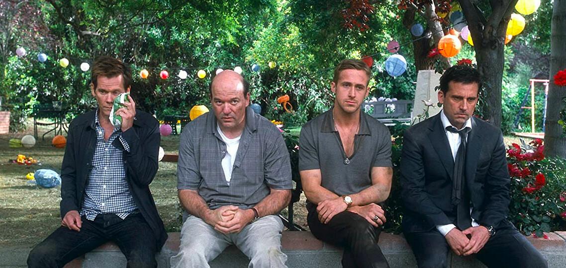 (L–R) Kevin Bacon, John Carroll Lynch, Ryan Gosling, and Steve Carell play irate, territorial, protective, and jealous husbands and boyfriends who have a group brawl in Cal's backyard, necessitating a lecture from the cops, in "Crazy, Stupid, Love.” (Warner Bros.)