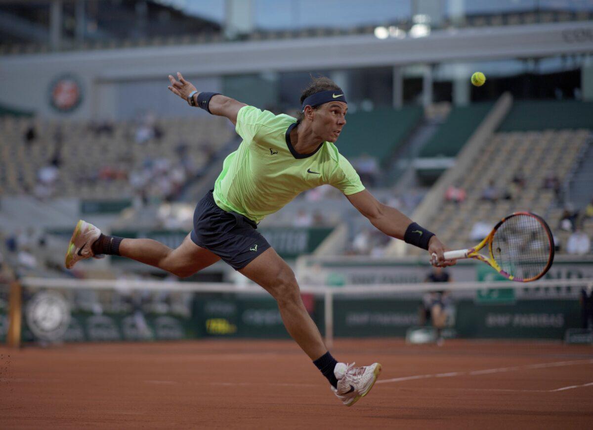 Spain's Rafael Nadal plays a return to Italy's Jannik Sinner during their fourth-round match on day 9, of the French Open tennis tournament at Roland Garros in Paris, France, on June 7, 2021. (Christophe Ena/AP Photo)
