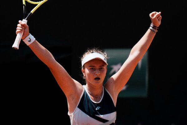 Czech Republic's Barbora Krejcikova raises her arms as she defeats United States's Coco Gauff during their quarterfinal match of the French Open tennis tournament at the Roland Garros stadium in Paris on June 9, 2021. (Thibault Camus/AP Photo)
