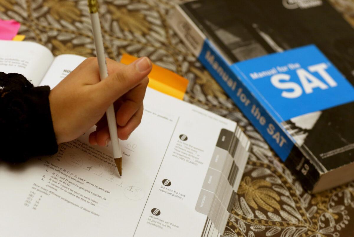 A student uses a Princeton Review SAT Preparation book to study for the test in Pembroke Pines, Fla., on March 6, 2014. (Joe Raedle/Getty Images)