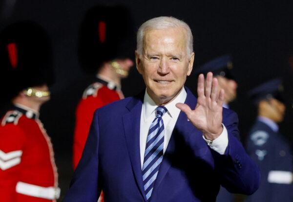 President Joe Biden waves upon arrival at Cornwall Airport Newquay, near Newquay, Cornwall, United Kingdom, on June 9, 2021. (Phil Noble/Pool/Reuters)