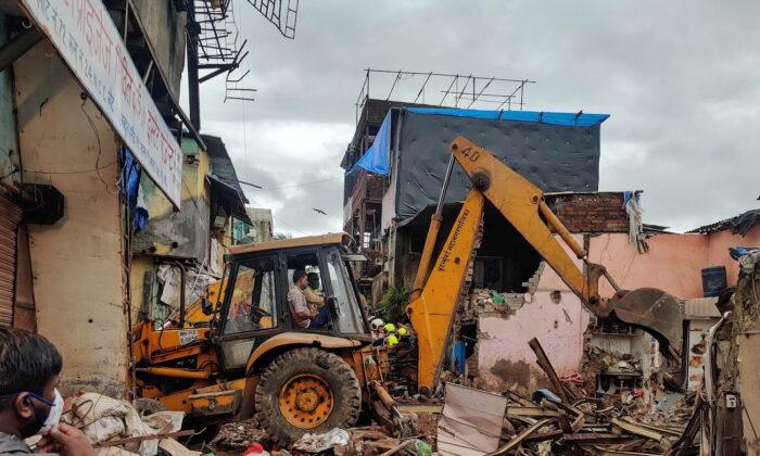 Building Collapse in Mumbai Kills 11, Including 8 Children, Rescuers Search for Survivors