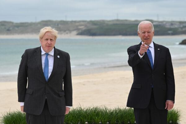 UK Prime Minister Boris Johnson and U.S. President Joe Biden pose during the G-7 Summit in Carbis Bay, Cornwall, UK, on June 11, 2021. (Leon Neal/WPA Pool/Getty Images)
