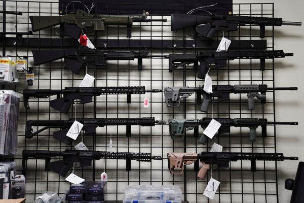 AR-15 style rifles are displayed for sale at Firearms Unknown, a gun store in Oceanside, Calif., on April 12, 2021. (Bing Guan/Reuters)