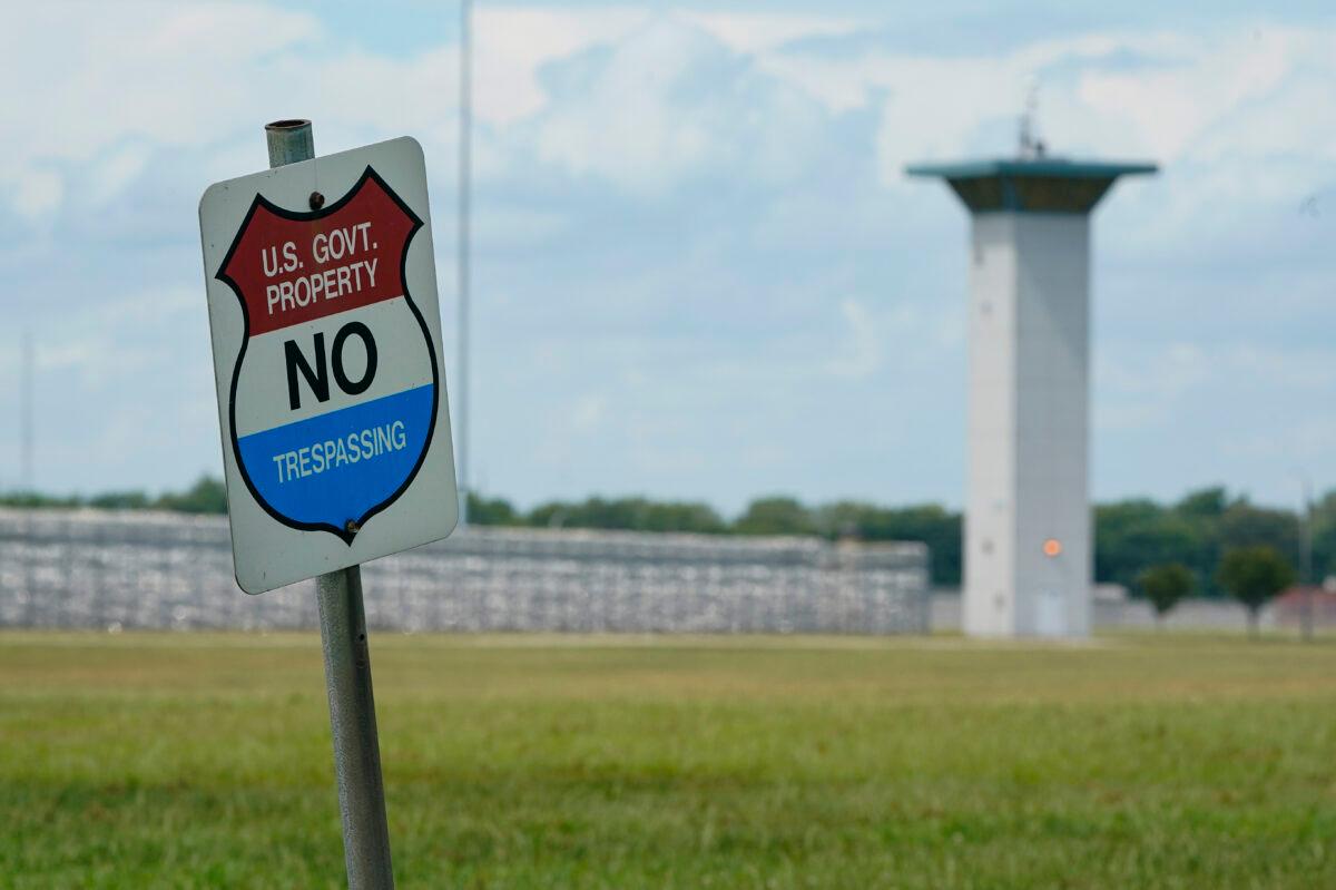 A "No Trespassing" sign is displayed outside the federal prison complex in Terre Haute, Ind., on Aug. 28, 2020. (Michael Conroy/AP Photo)