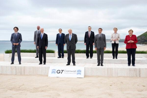 Leaders of the G-7 pose for a group photo overlooking the beach at the Carbis Bay Hotel in Carbis Bay, St. Ives, Cornwall, England, on June 11, 2021.  (Patrick Semansky/Pool/AP Photo)