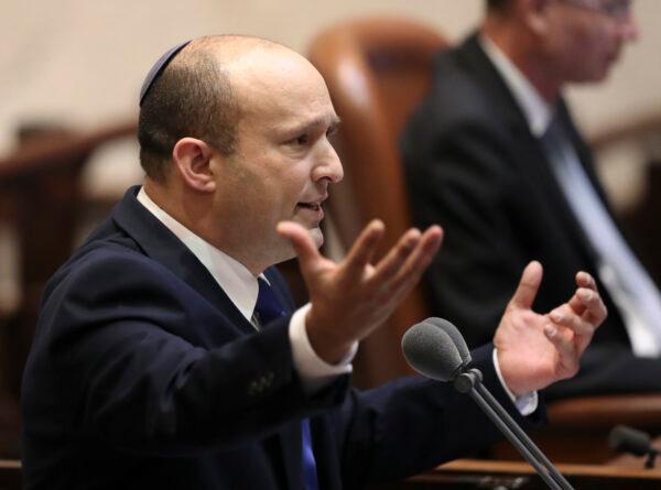 Israel's designated new prime minister, Naftali Bennett, speaks during a Knesset session in Jerusalem on June 13, 2021. (Ariel Schali/AP Photo)