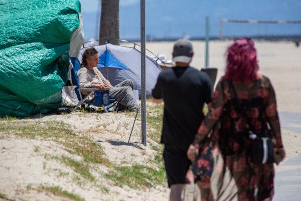 A homeless individual in Venice Beach, Calif., on June 8, 2021. (John Fredricks/The Epoch Times)